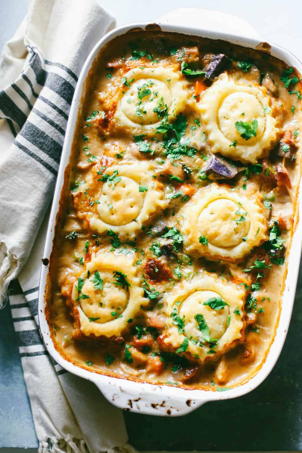 chicken pot pie casserole recipe topped with circles of puff pastry