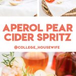 Aperol Pear Cider Spritz in a low clear glass with a sliced pear and a rosemary sprig.