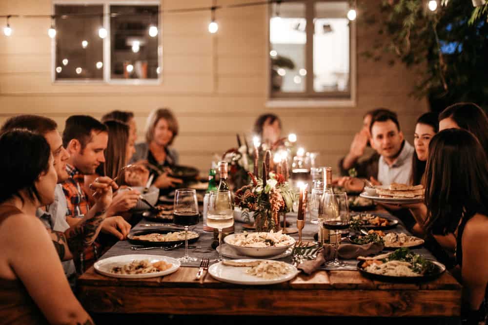 Friends enjoying a dinner party.