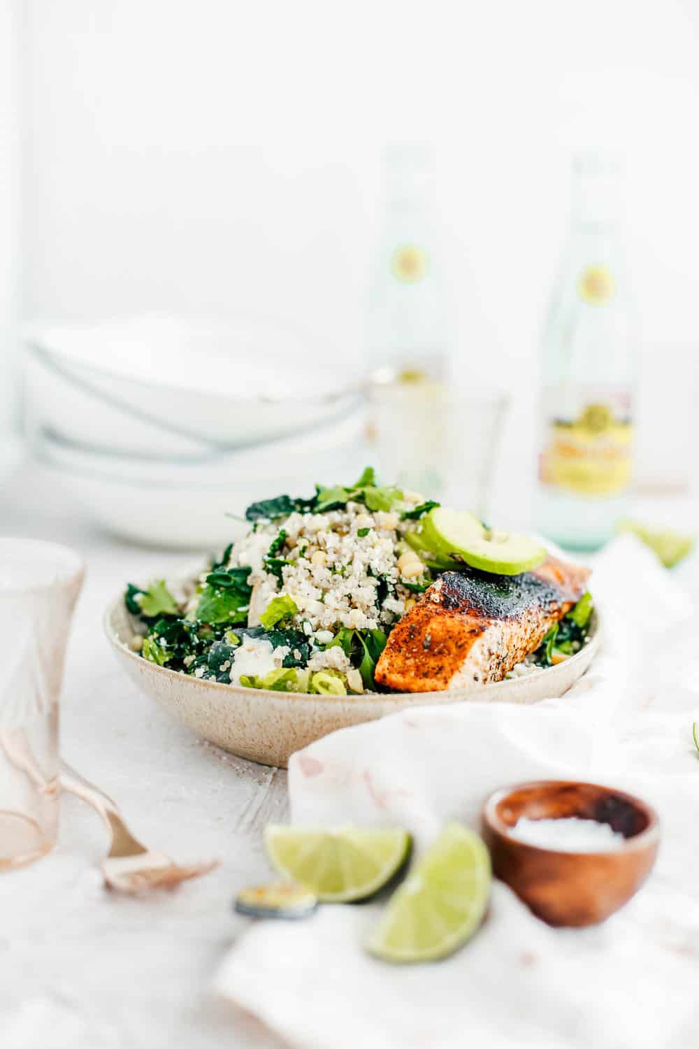 Kale Caesar Salad with Golden Corn Quinoa and Salmon in a Bowl