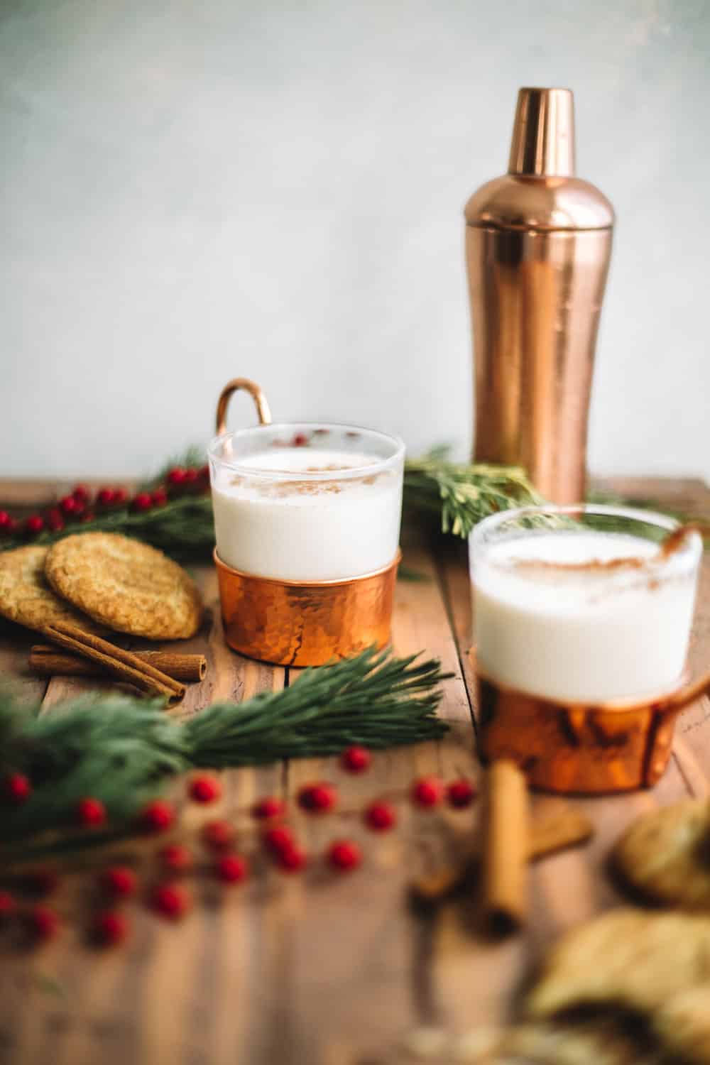  I still love having smaller parties through out the month and I’m almost always going to bring a dish with me! Tonight I wanted to whip up something extra festive and very ‘santa’ themed because it is Christmas Eve after all! Earlier this month when we made a Mrs. Claus cocktail I knew we needed to have a Mr. Claus cocktail! This cocktail is all about the cookies! Because after the nights Santa has I think he might need something a little stronger than a snickerdoodle ;) This was hands down one of my favorite cocktails of the year! The flavor was just SO good. We soaked milk in a bowl of snickerdoodles as the base and spiced everything up with cinnamon and whiskey. I was getting some major Christina Tossi Milk bar vibes with this cocktail! The recipe for this easy and festive cocktail comes together very easily but be sure to soak your milk with the snickerdoodles for a few hours before making them! Cheers! And Merry Christmas everyone! 