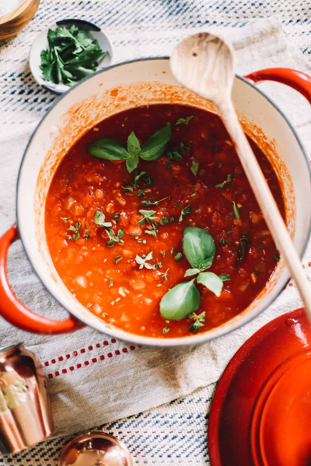 Dutch oven filled with homemade tomato sauce. 