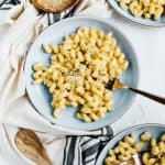 stovetop mac and cheese on blue plate with fork