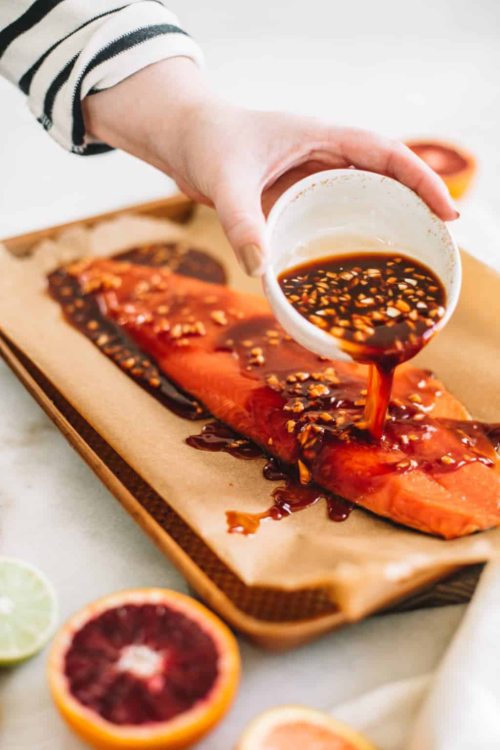 Your next weeknight dinner needs to be this blood orange salmon fillet with an easy ginger garlic stir fry. This is a tasy, flavorful and healthy recipe!