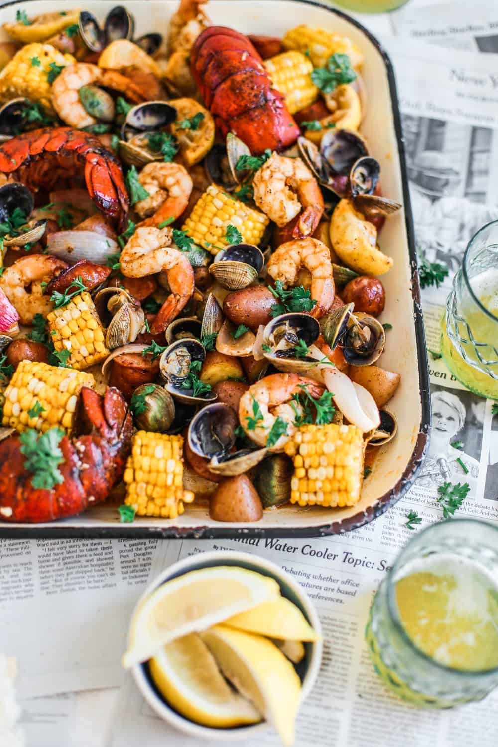 clams, shrimp, lobster, potatoes, corn on sheet pan