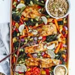 soy, garlic and ginger glazed salmon with broccolini, carrots, peppers and onions on sheet pan