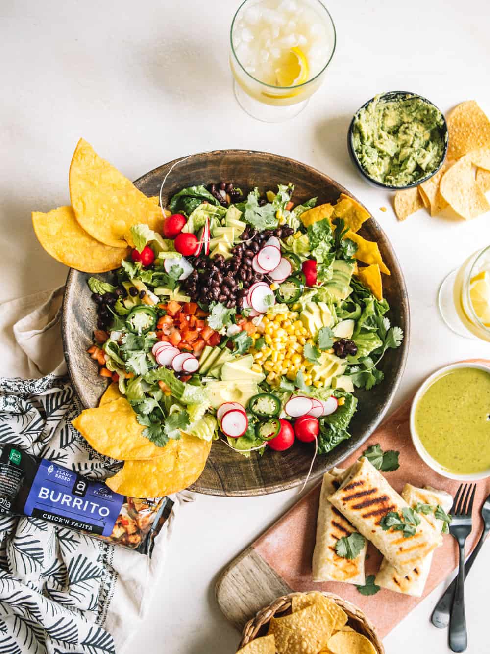 A big wooden bowl of Chopped Tostada Salad with Avocado Cilantro Dressing