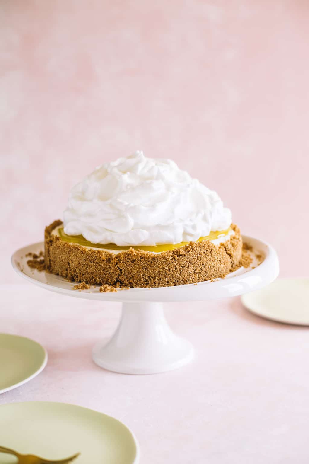 Untoasted Lemon Meringue Cheesecake on a white platter