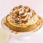 No Bake Lemon Meringue Cheesecake on a white platter