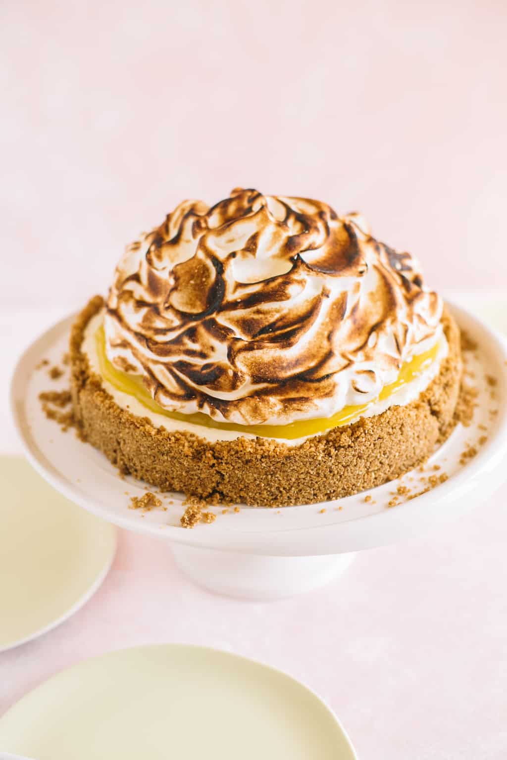 No Bake Lemon Meringue Cheesecake on a white platter