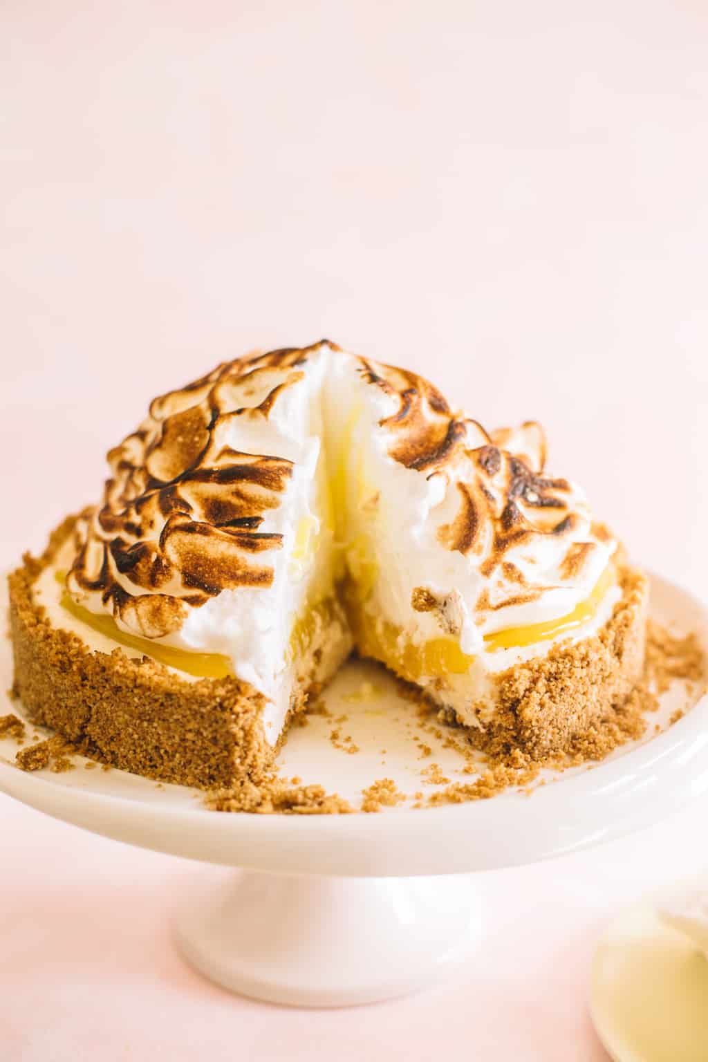 No Bake Lemon Meringue Cheesecake on a white platter