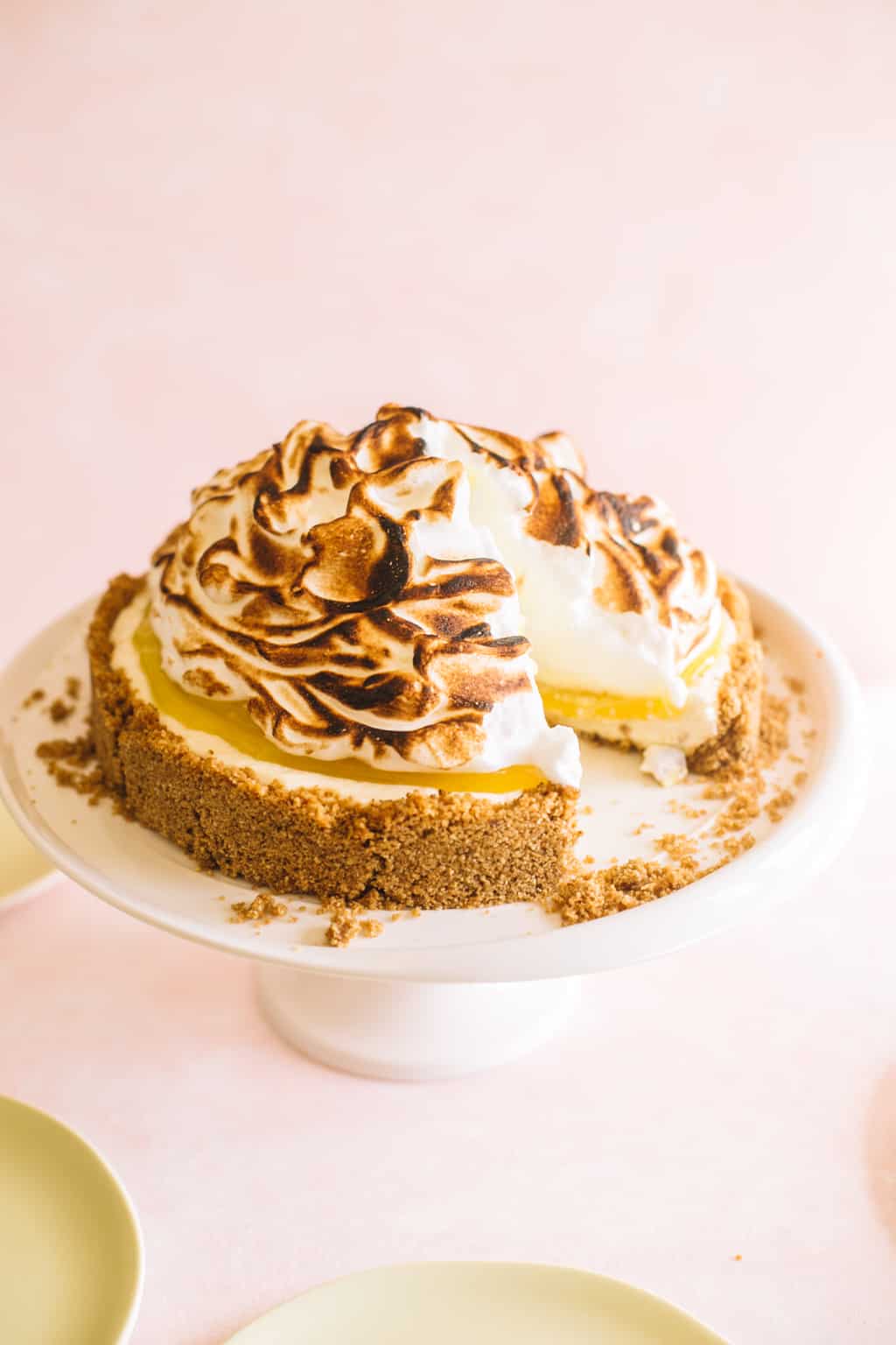 No Bake Lemon Meringue Cheesecake on a white platter