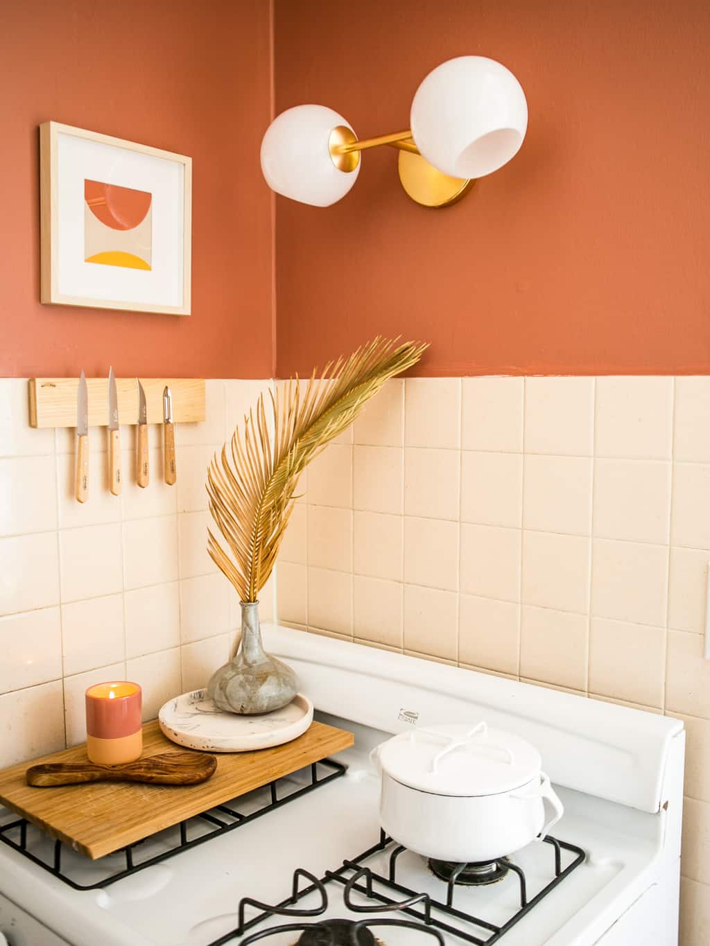 New light fixture with coral walls and a knife magnet. 