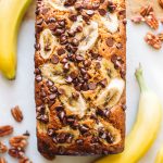 banana nut bread loaf with chocolate chips and banana slices