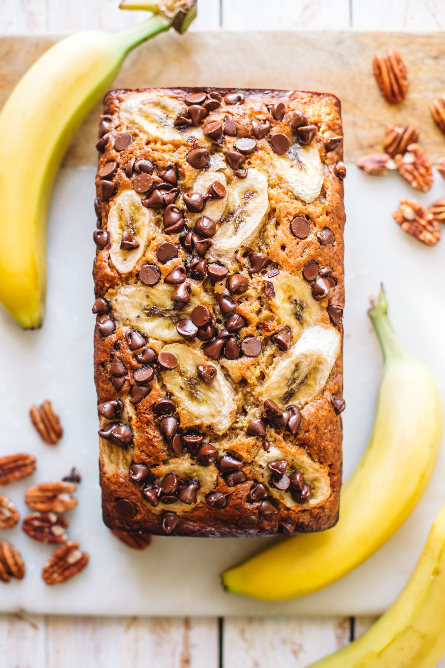 banana nut bread loaf with chocolate chips and banana slices