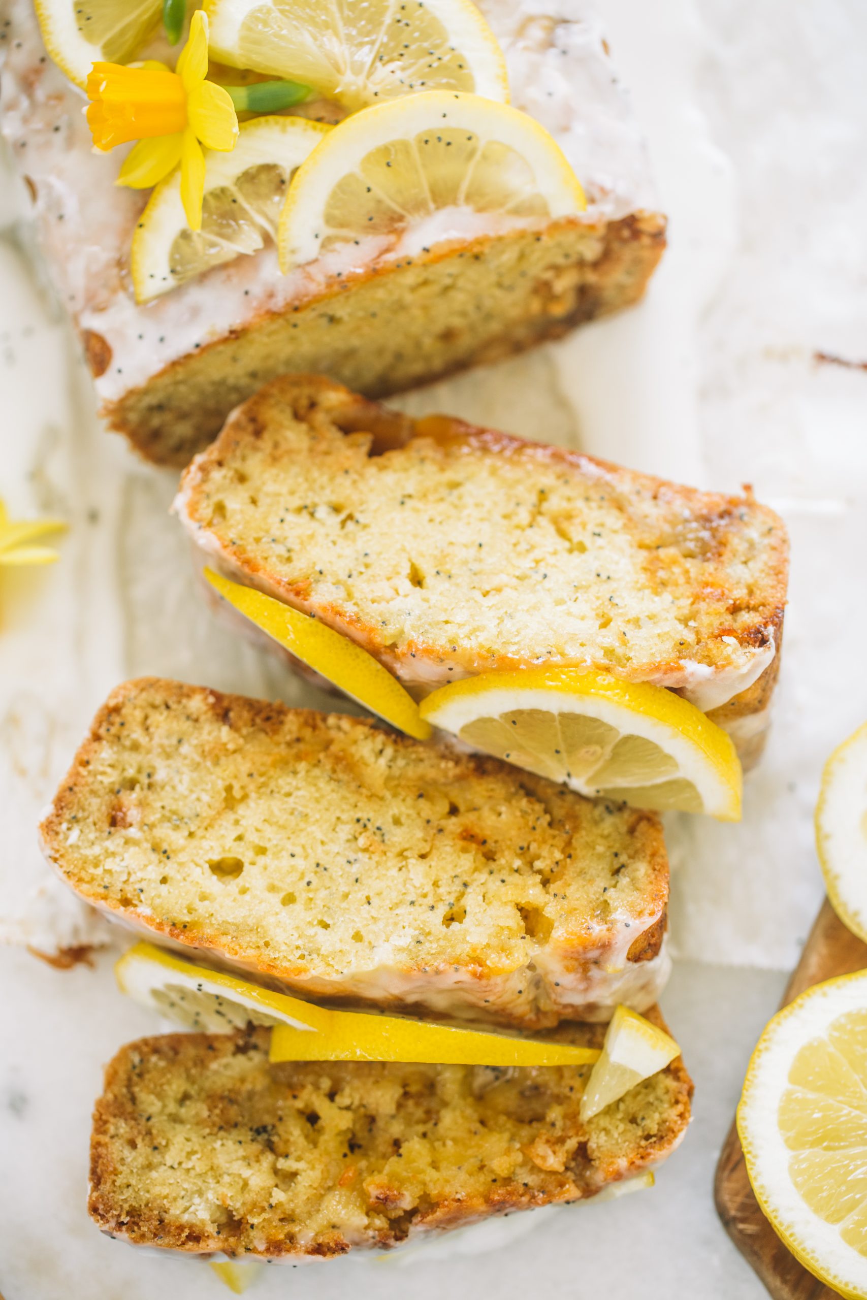 Lemon Poppyseed Loaf Cake sliced open. 