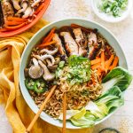 chicken ramen recipe in blue bowl with chopsticks