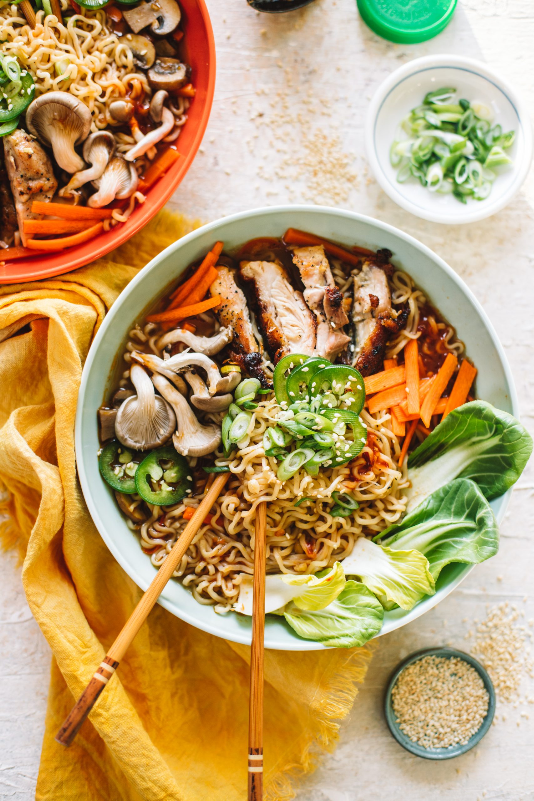 chicken ramen recipe in blue bowl with chopsticks