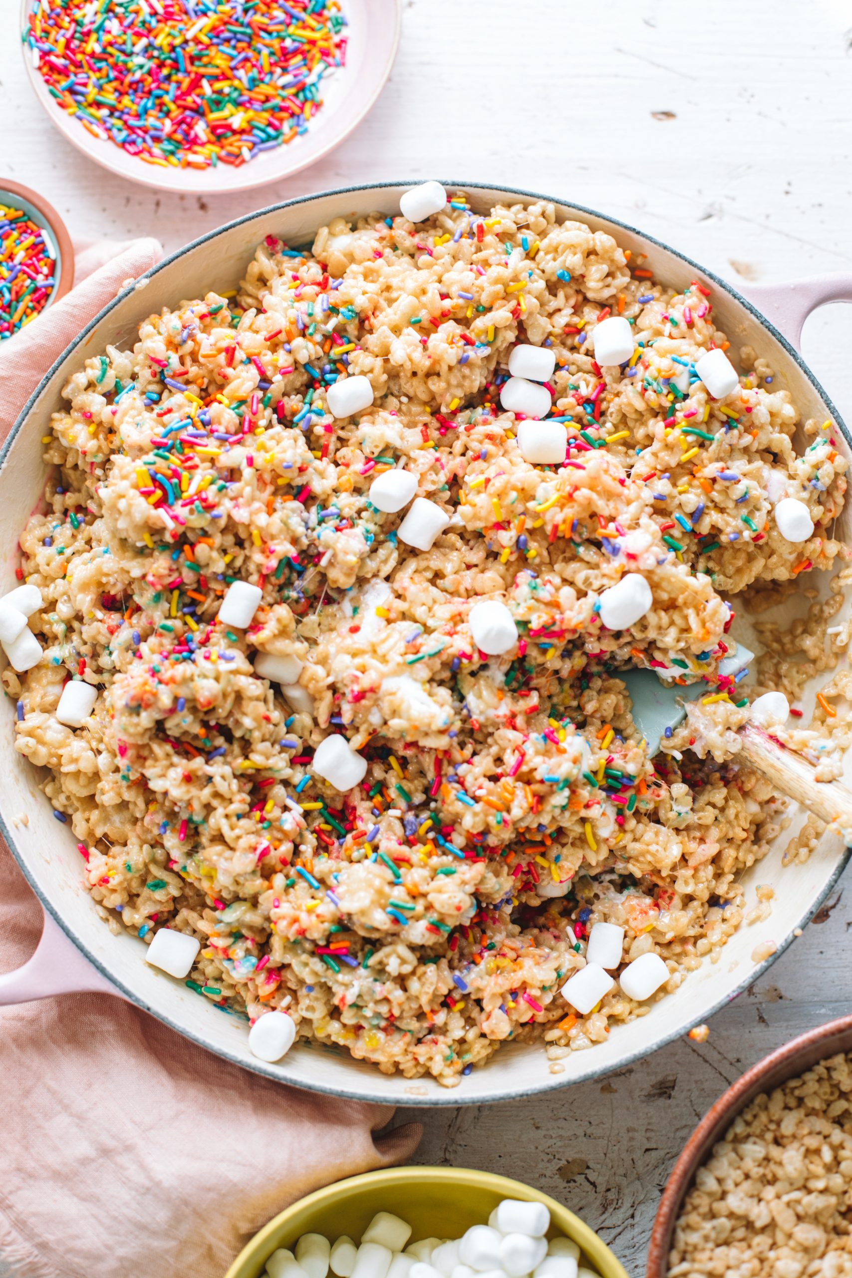 Rainbow rice krispie treats with whole marshmallows.