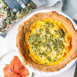 Baked quiche serve with an everything bagel salad kit.