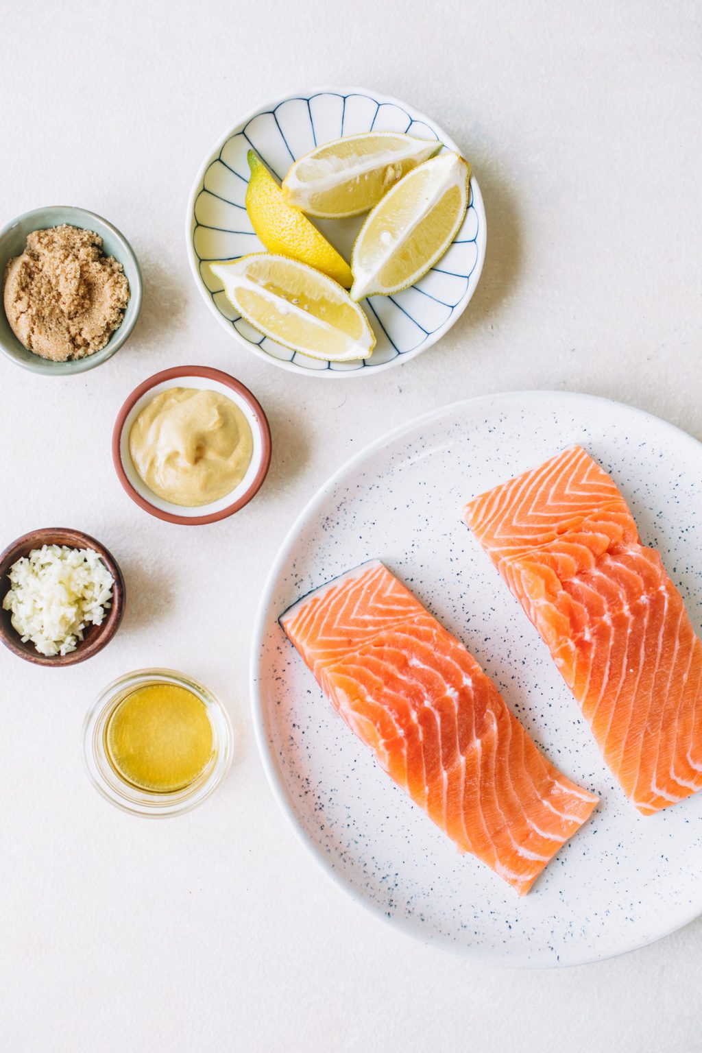 lemon wedges, brown sugar, dijon mustard, garlic, bourbon, salmon fillets