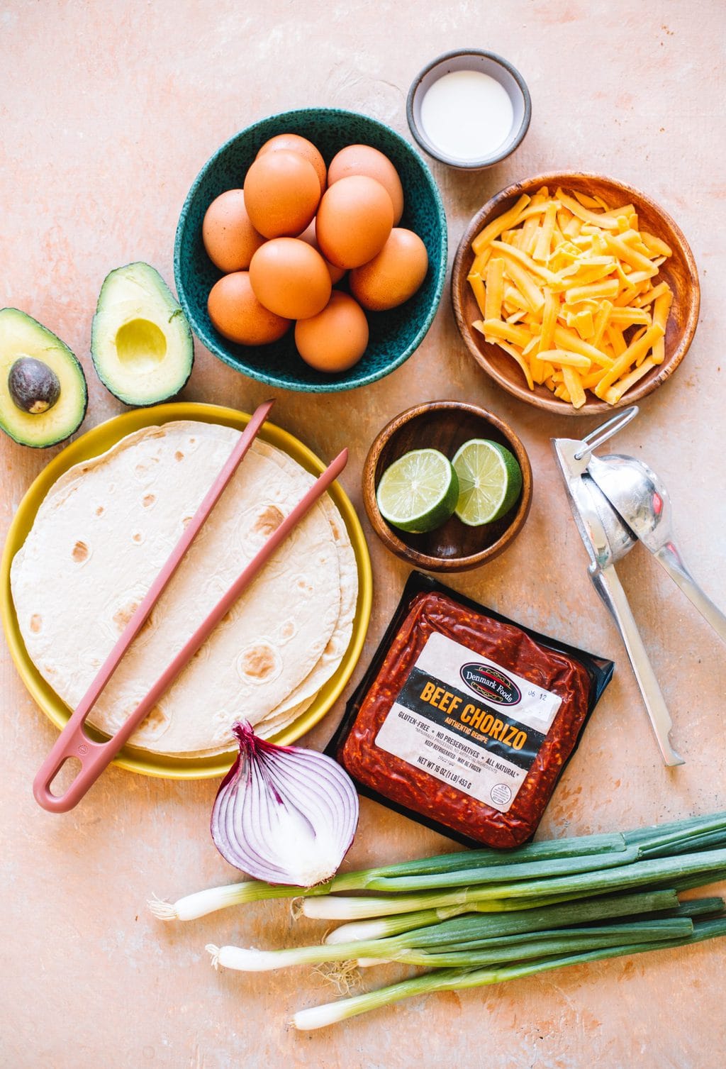 eggs, cheddar cheese, juicer, lime, beef chorizo, flour tortillas, red onion, avocado