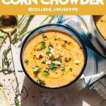 golden yellow corn chowder recipe in blue bowl garnished with fresh corn, chives and parsley