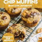 zucchini chocolate chip muffins with bite taken out on wire rack