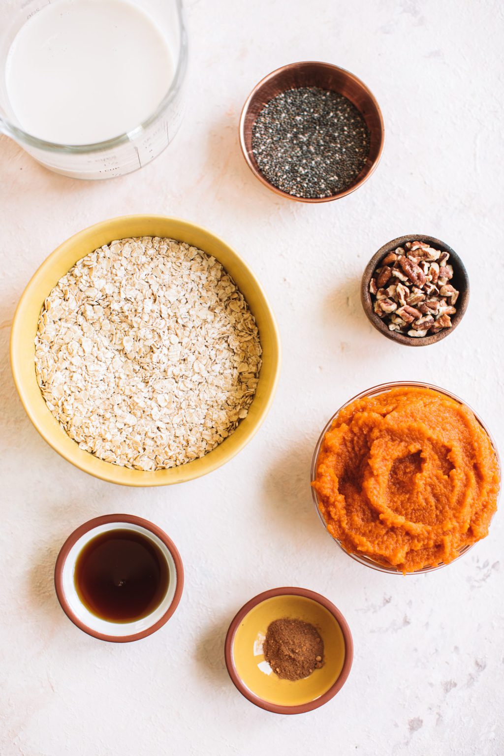 rolled oats, almond milk, chia seeds, pecans, pumpkin puree, pumpkin pie spice, maple syrup