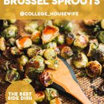 crispy brussels sprouts with sweet and spicy glaze on baking sheet with wooden spoon