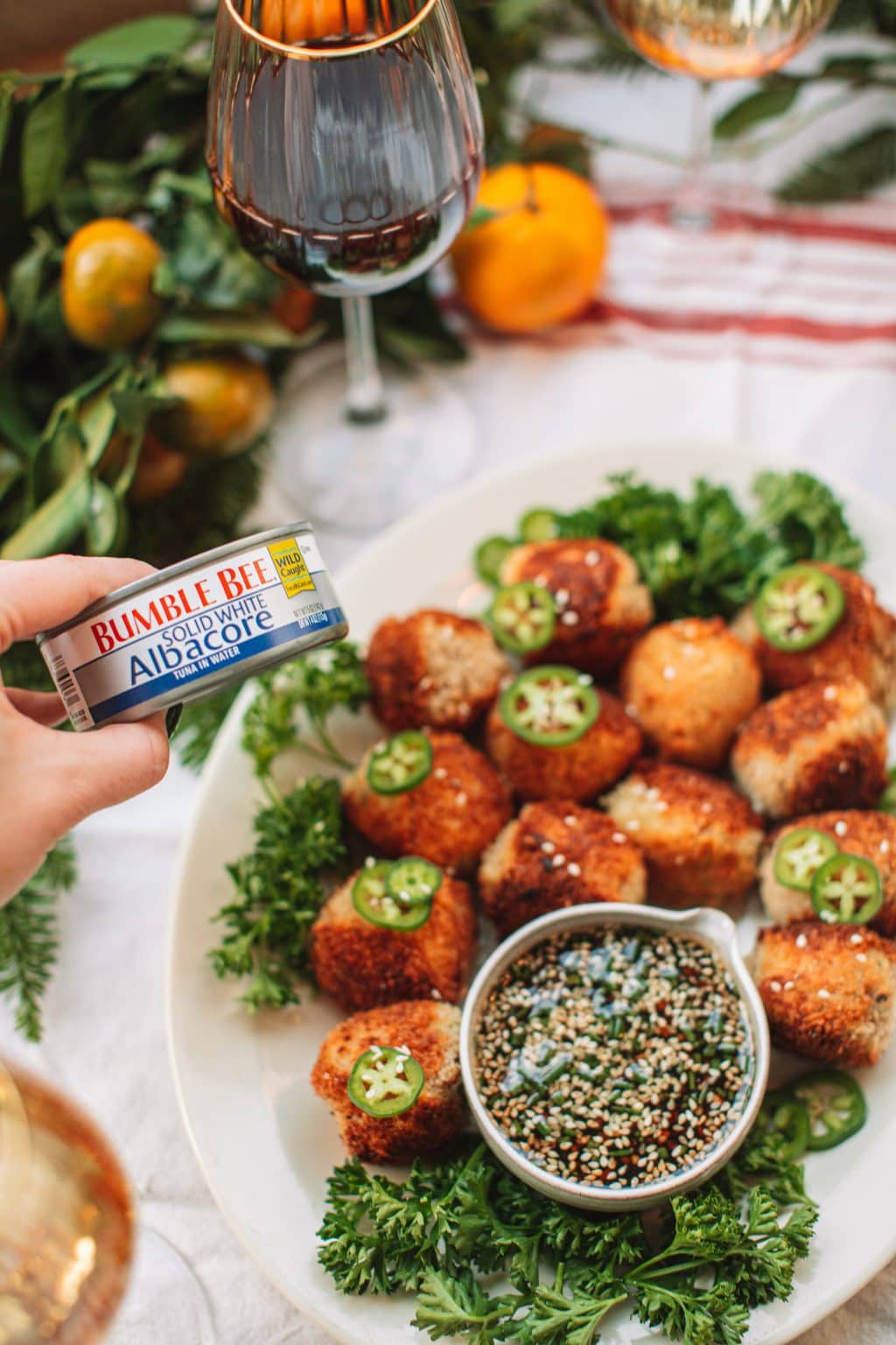 A can of bumble bee tuna with a platter of spicy tuna croquettes.