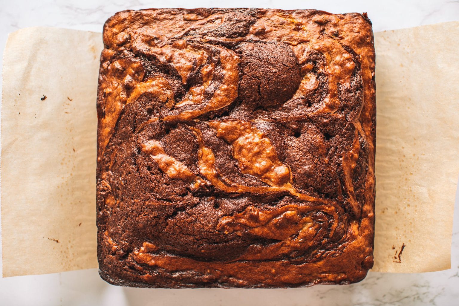 Banana bread brownies baked and cooling out of the pan. 