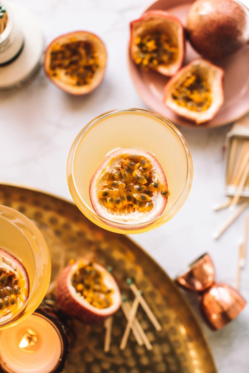 Passion fruit martini in a chilled coupe glass.