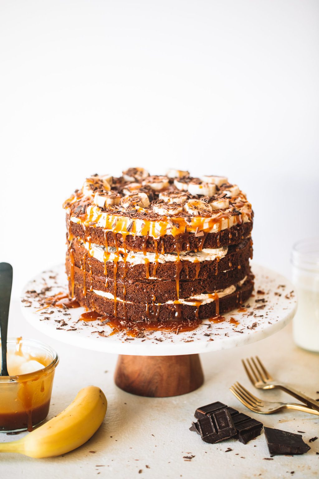 Finished banoffee cake on cake stand.