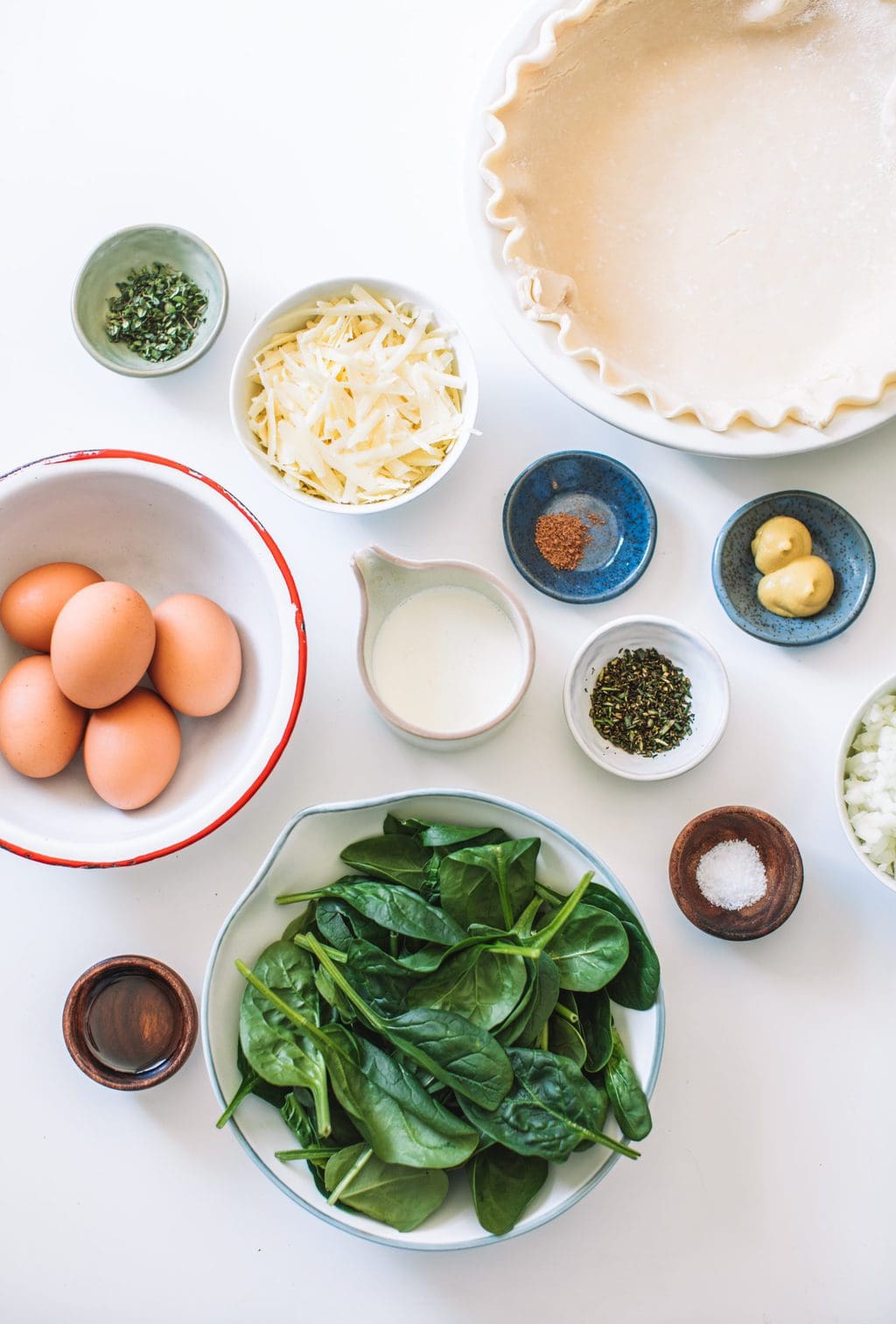 pie crust, gruyere, herbs, Dijon mustard, cream, salt, pepper, eggs, spinach, nutmeg