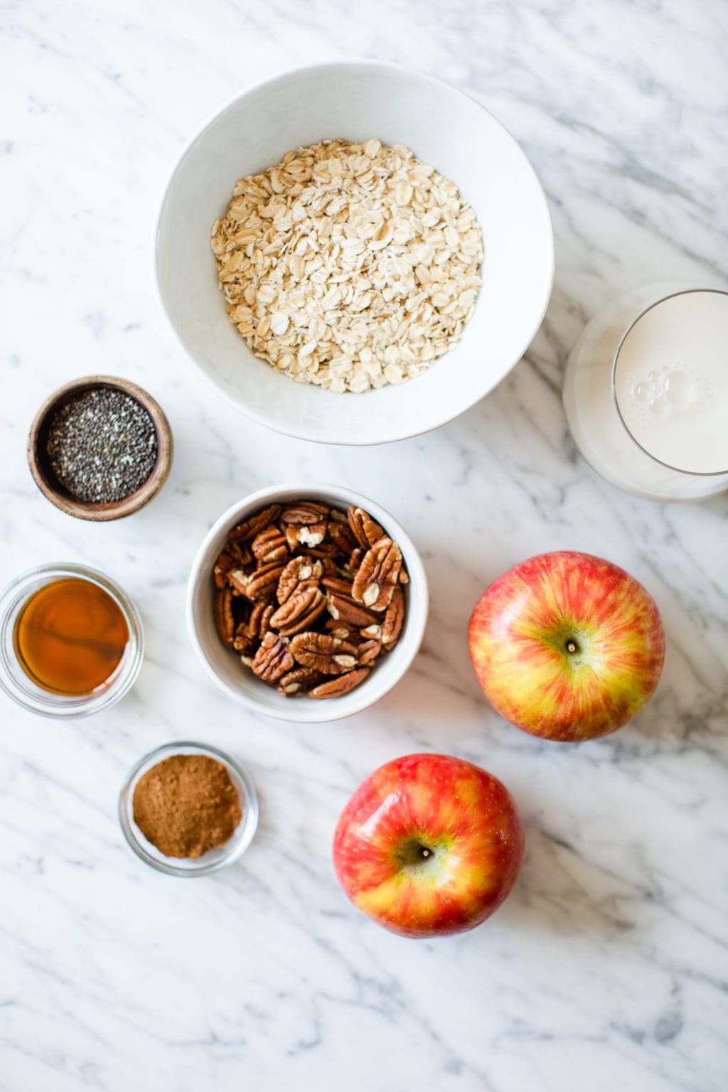 rolled oats, chia seeds, maple syrup, pecans, cinnamon, two apples, almond milk