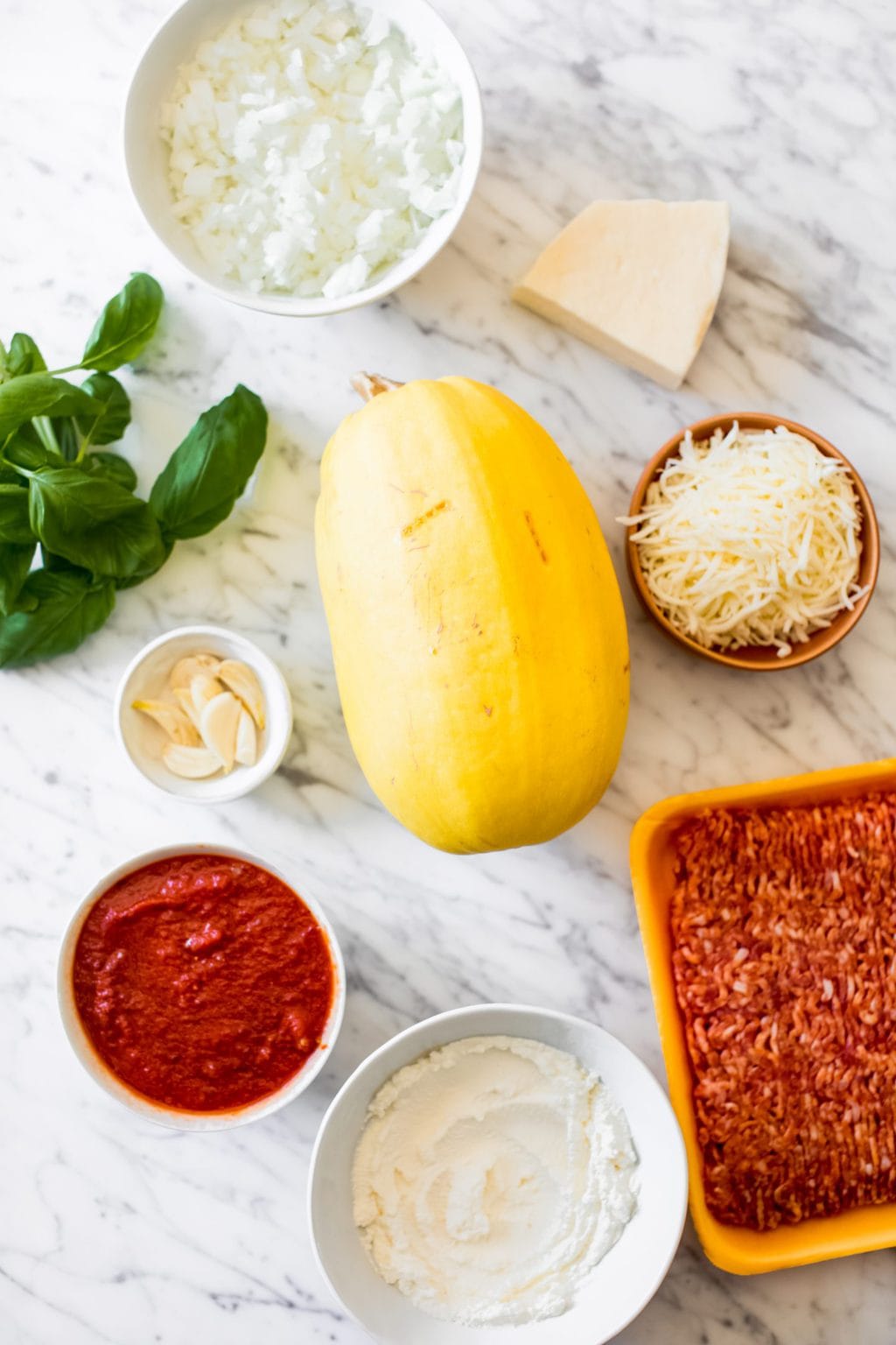 onion, basil, garlic, spaghetti squash, ricotta, ground sausage, marinara, parmesan