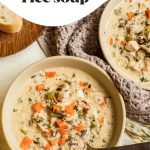 creamy chicken and rice soup in a soup bowl with spoon