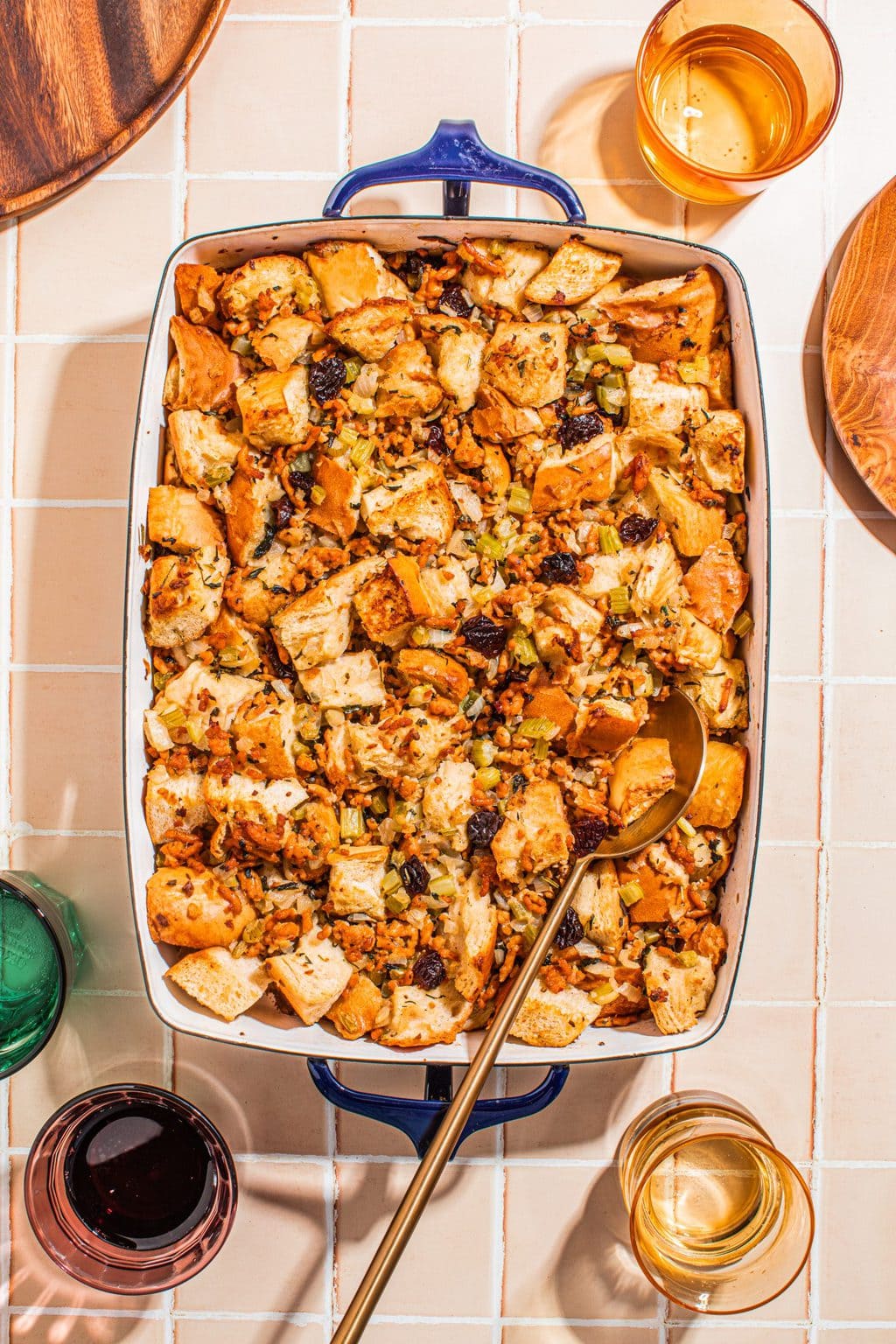 sausage and herb stuffing in white casserole dish