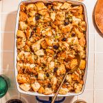sausage and herb stuffing in white casserole dish