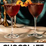 Two chocolate manhattans in a small coupe glass.