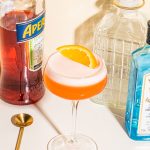 gin and aperol cocktail garnished with orange slice