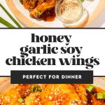 honey soy garlic chicken wings on a cream plate with a side of sesame seeds