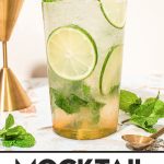 virgin mojito in highball glass with lime wheels and fresh mint