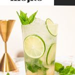 highball glass filled with virgin mint mocktail with lime wheels and fresh mint