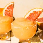 frozen palomas garnished with grapefruit slices