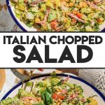 Italian chopped salad in large bowl with serving utensils