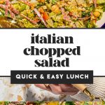 Italian chopped salad in large bowl with serving utensils