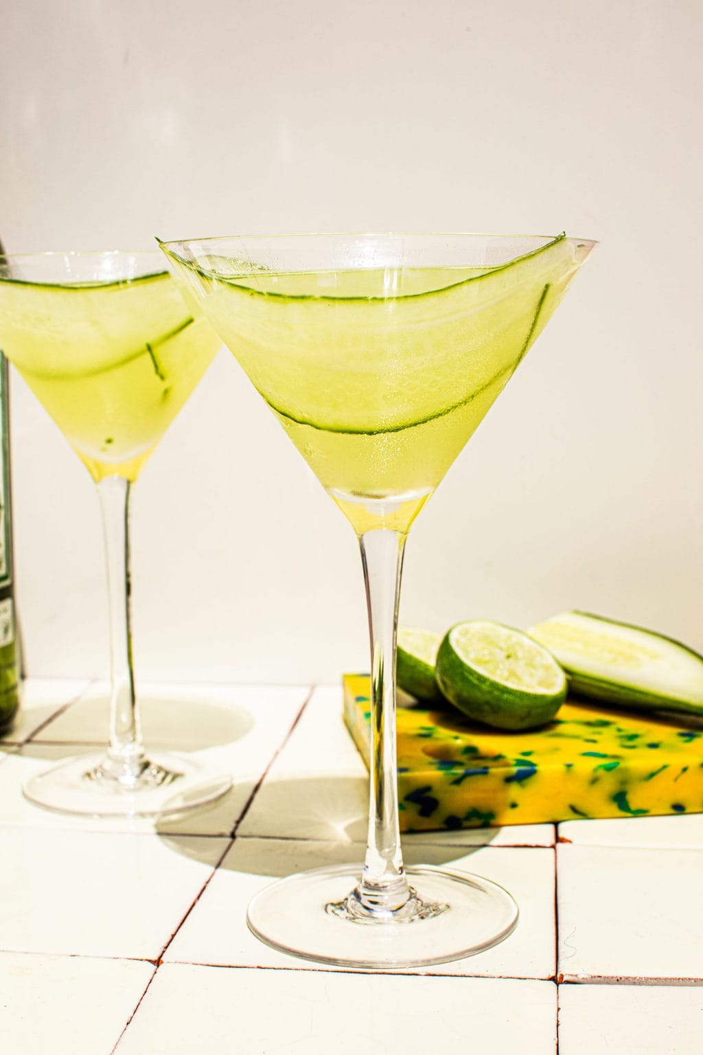 two cucumber martini with cucumber ribbon garnish