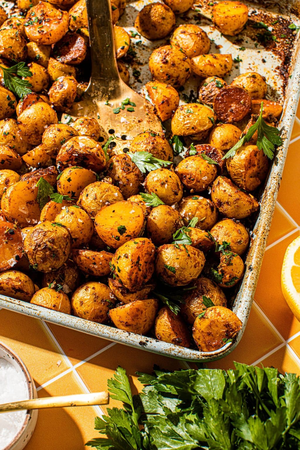 lemon herb potatoes on baking sheet